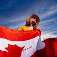 a-photograph-of-a-woman-holding-a-canadian-flag-2961063