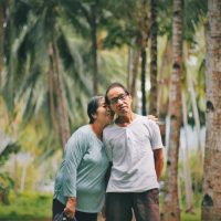 selective-focus-photo-of-old-couple-standing-together-with-2844982